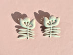 Les boucles vert pistache Fleur