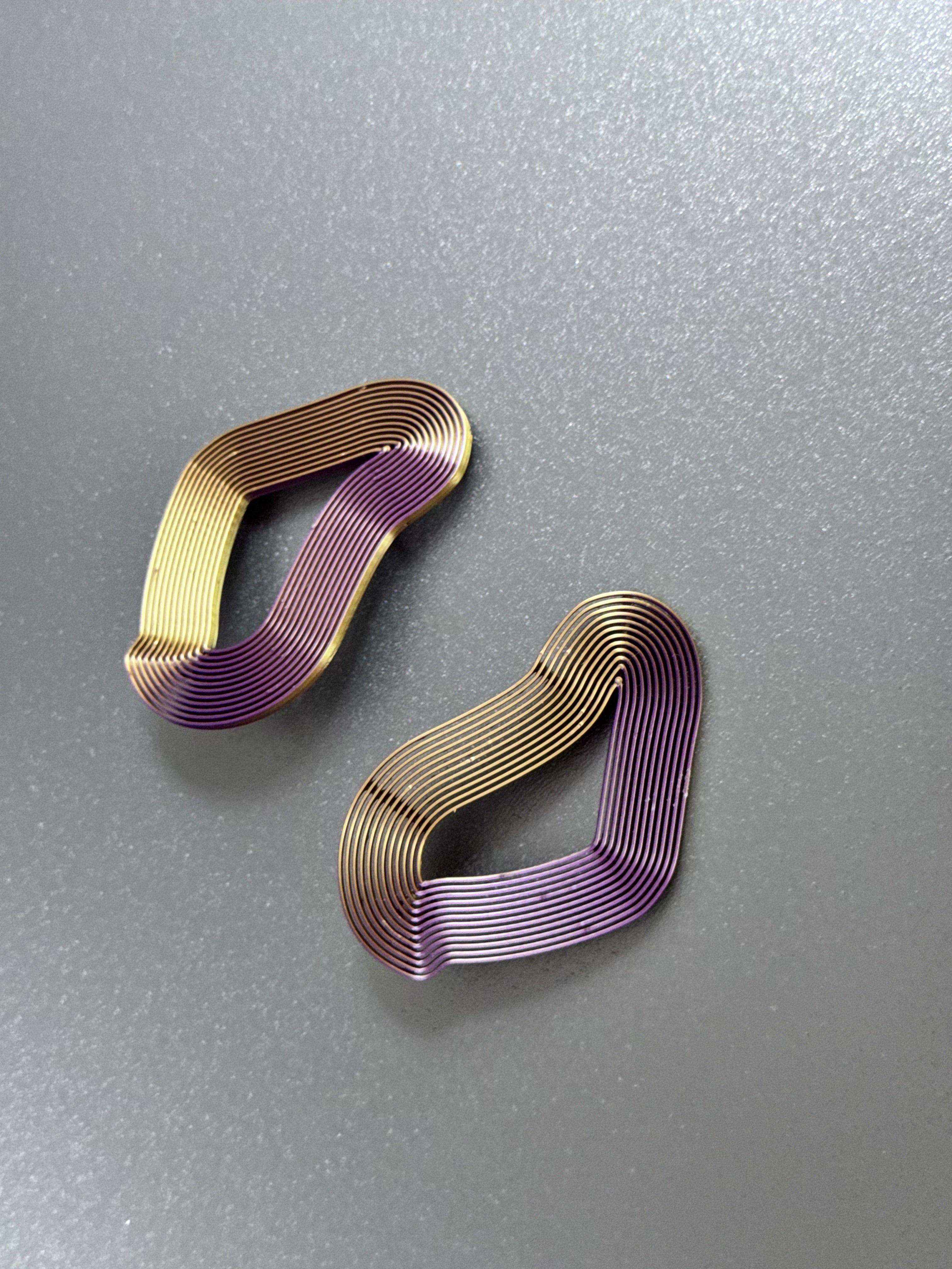 gold-violet linear earrings irregular shape