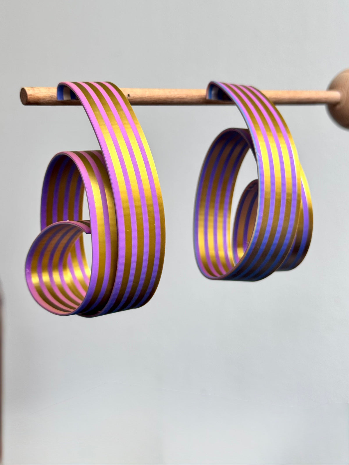 original light hoop earrings rainbow and gold and silver sculptural earrings by Mietet